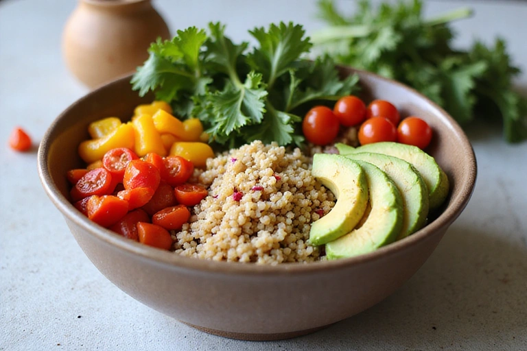 A vibrant bowl filled with diverse plant-based foods like quinoa, avocado, colorful bell peppers, cherry tomatoes, and leafy greens.